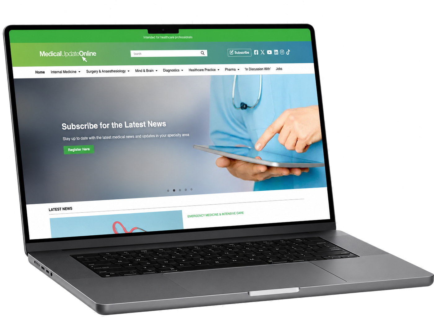 The MedicalUpdateOnline homepage displayed on a laptop screen